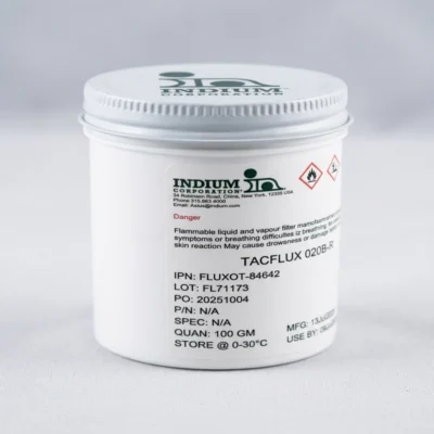 A 100g white plastic jar of Indium Corporation TACFlux® 020B no-clean tacky flux with a white screw-top lid. The label features the Indium Corporation logo, product name, and technical details including the 100 GM quantity and storage instructions.